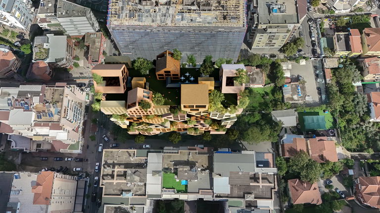 Esta impresionante torre en Albania parece un rompecabezas gigante de casas apiladas